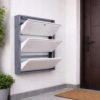 Wall-mounted 4-door grey metal shoe rack with white frame installed near wooden entrance door – space-saving premium Jootarack shoe storage cabinet