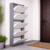Wall-mounted 4-door grey metal shoe rack with white frame installed near wooden entrance door – space-saving premium Jootarack shoe storage cabinet