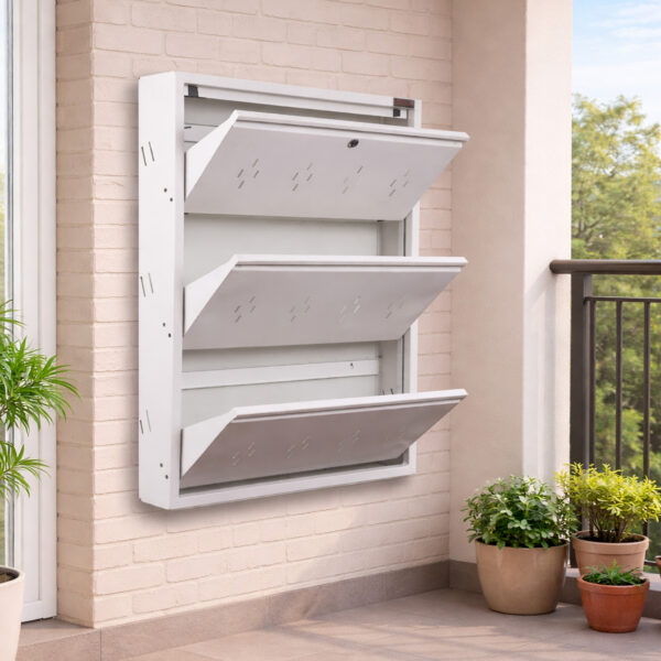 Wall-mounted 4-door grey metal shoe rack with white frame installed near wooden entrance door – space-saving premium Jootarack shoe storage cabinet
